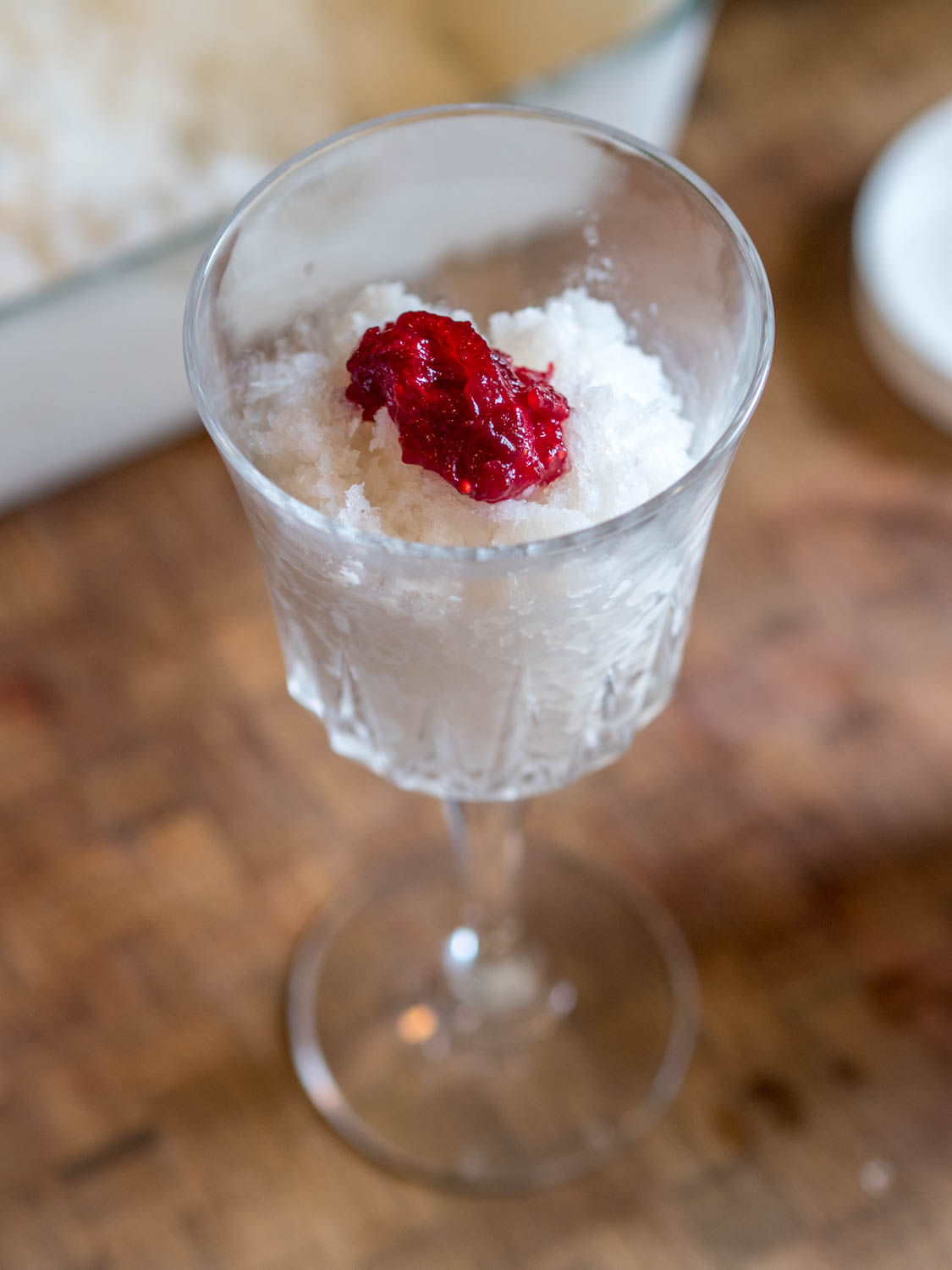 Makgeolli granita with a dollop of cranberry sauce